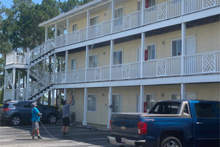 Commercial pressure washing a condo in gulf shores al